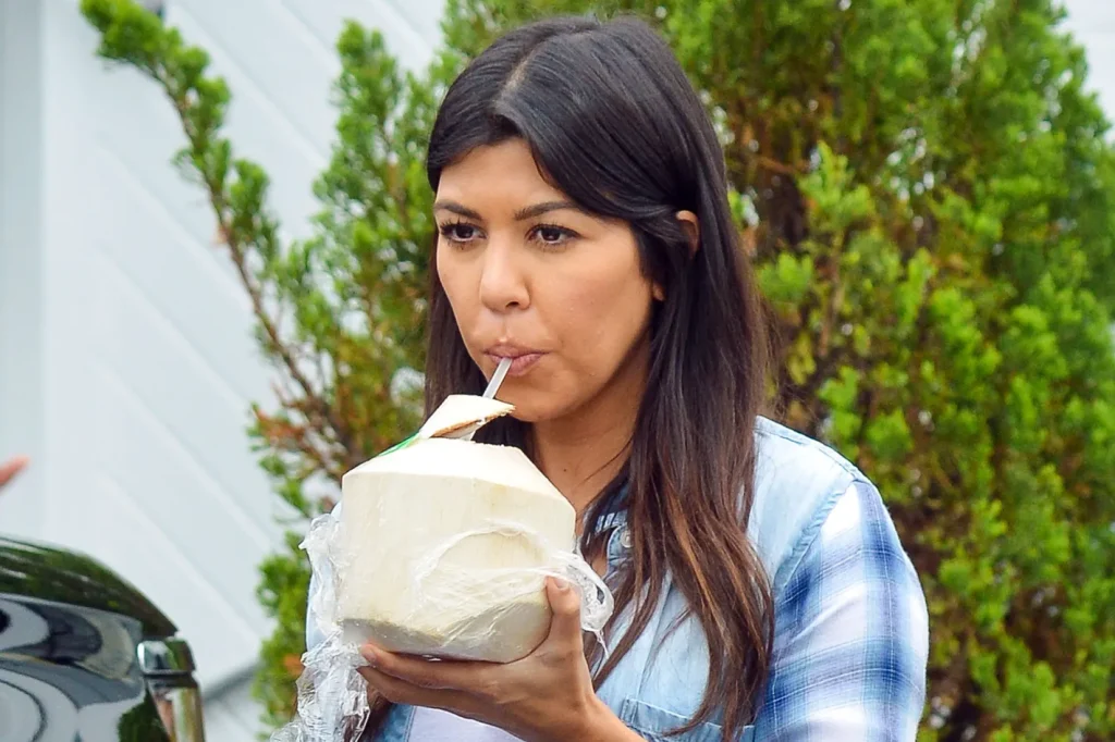 2f3e4d530ca493ad4d091cafcc78d17a8e 27 kourtney kardashian coconut.2x.rhorizontal.w710